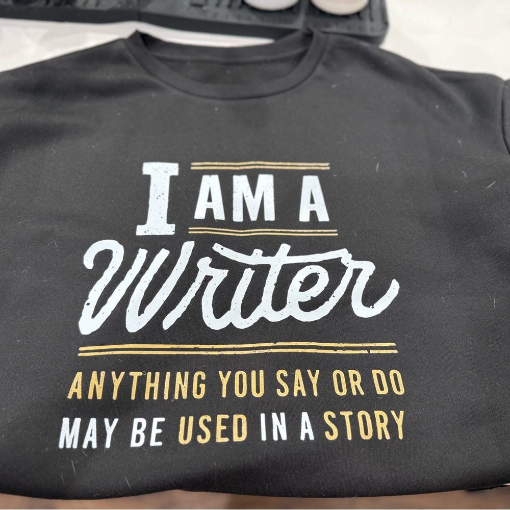 Black Graphic Sweatshirt with Writer Print